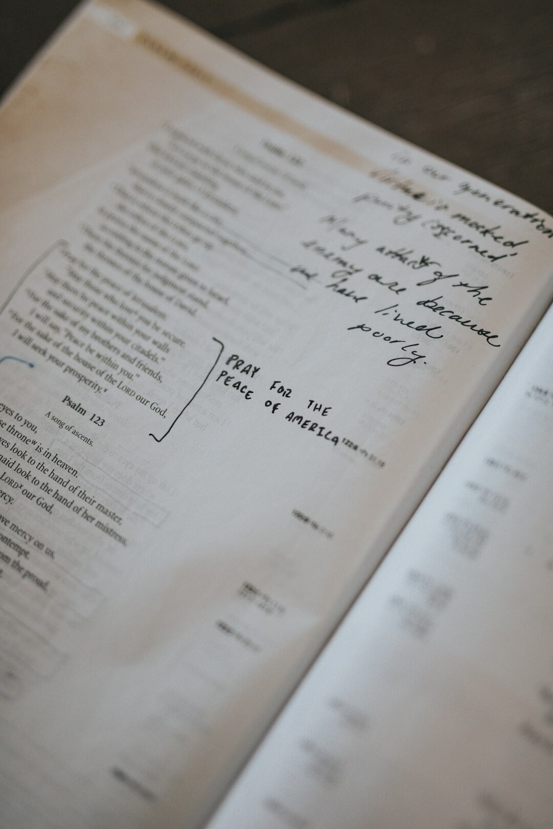 open book with handwritten notes